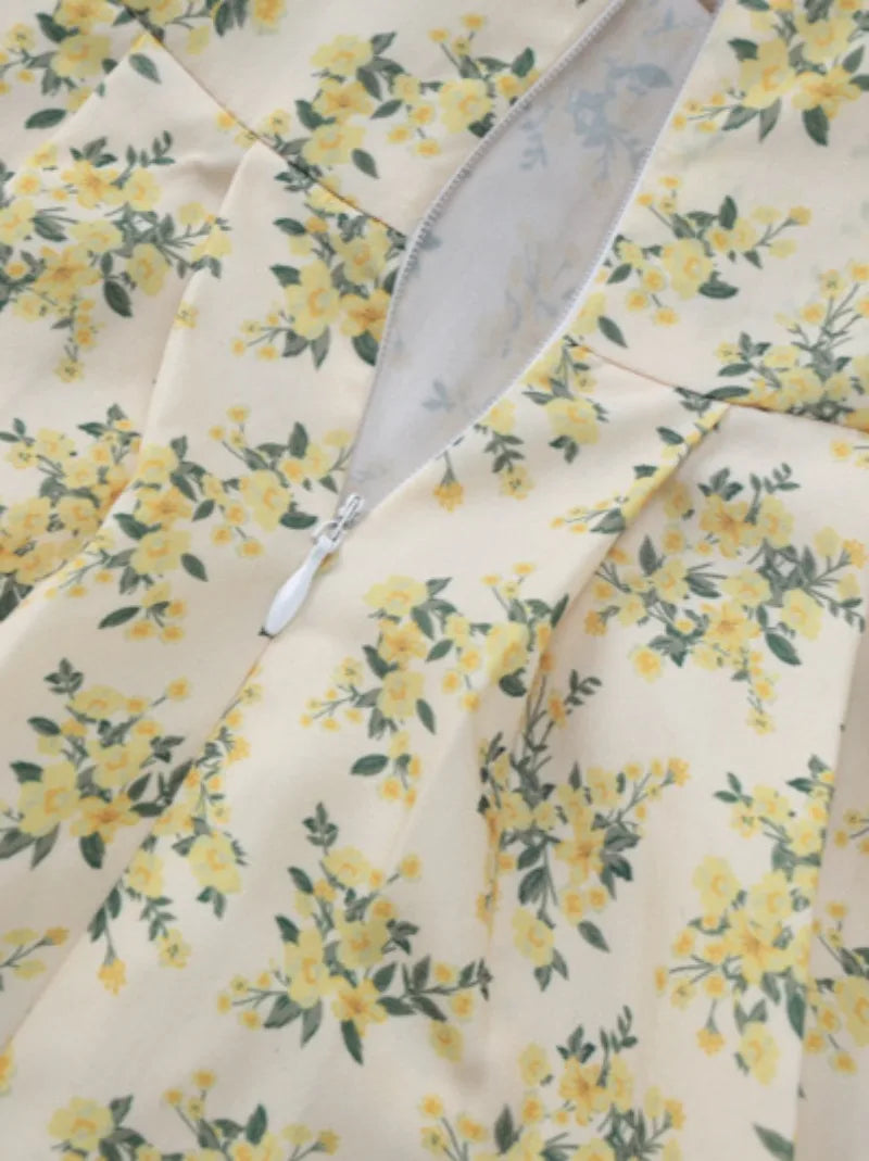 Women's Yellow Floral V-Neck Vacation Dress with Pleated Design