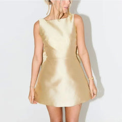 Gold Mini Dress with Statement Bow for Special Occasions