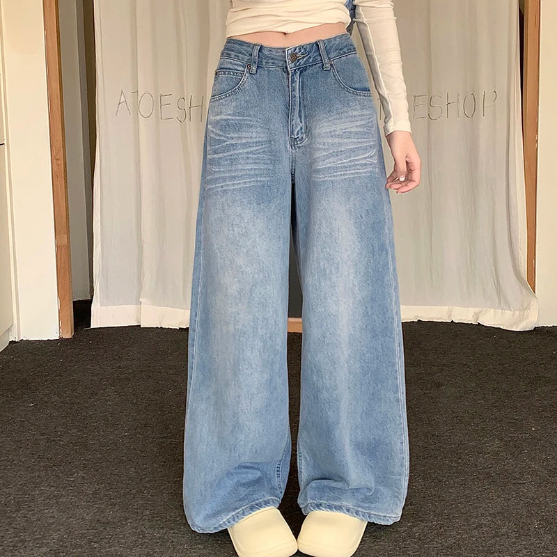 Jean large taille haute en denim délavé pour femme 