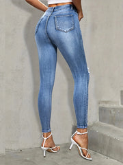 Jean skinny bleu déchiré pour femme, coupe slim, très extensible