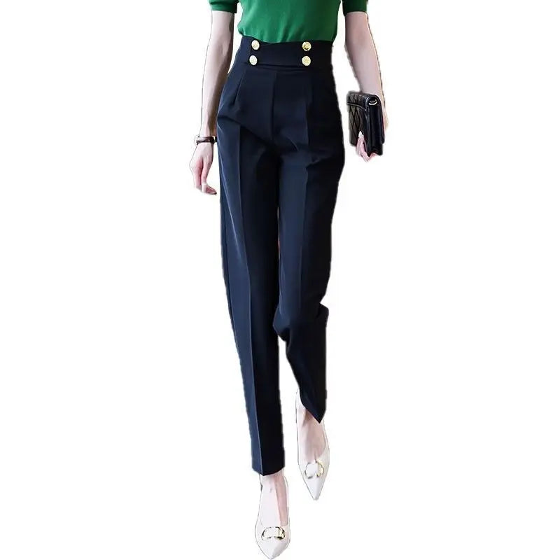 Pantalon de costume noir taille haute pour femme avec fermeture éclair et poches à l'arrière