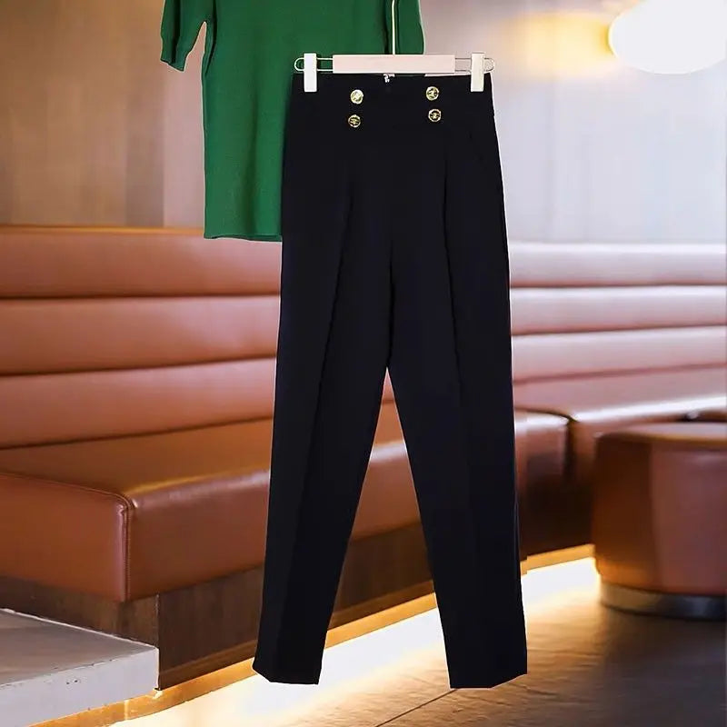 Pantalon de costume noir taille haute pour femme avec fermeture éclair et poches à l'arrière