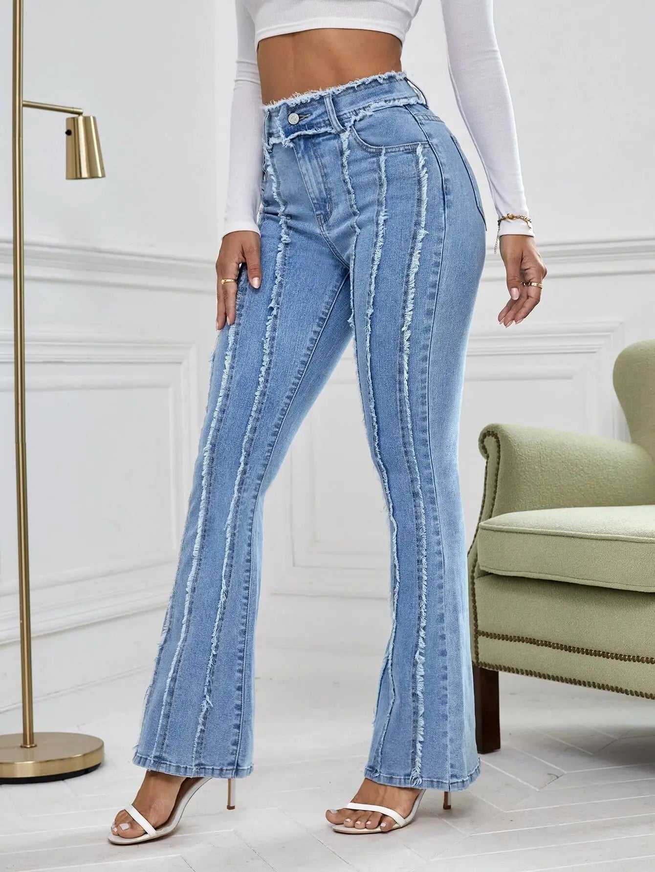 Jean évasé taille haute délavé vintage pour femme en denim bleu 