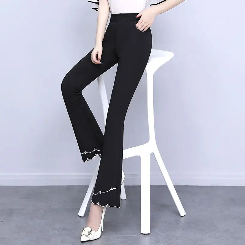 Pantalon patchwork brodé taille haute pour femme avec poches et coupe slim