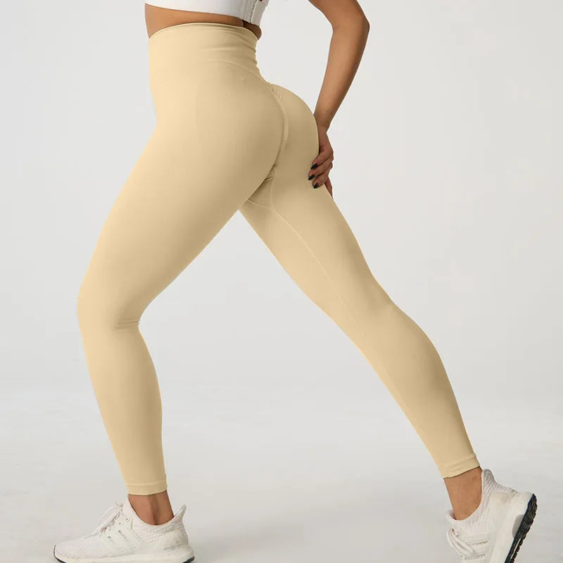 Legging de sport taille haute sans coutures couleur pêche pour le yoga et le fitness 