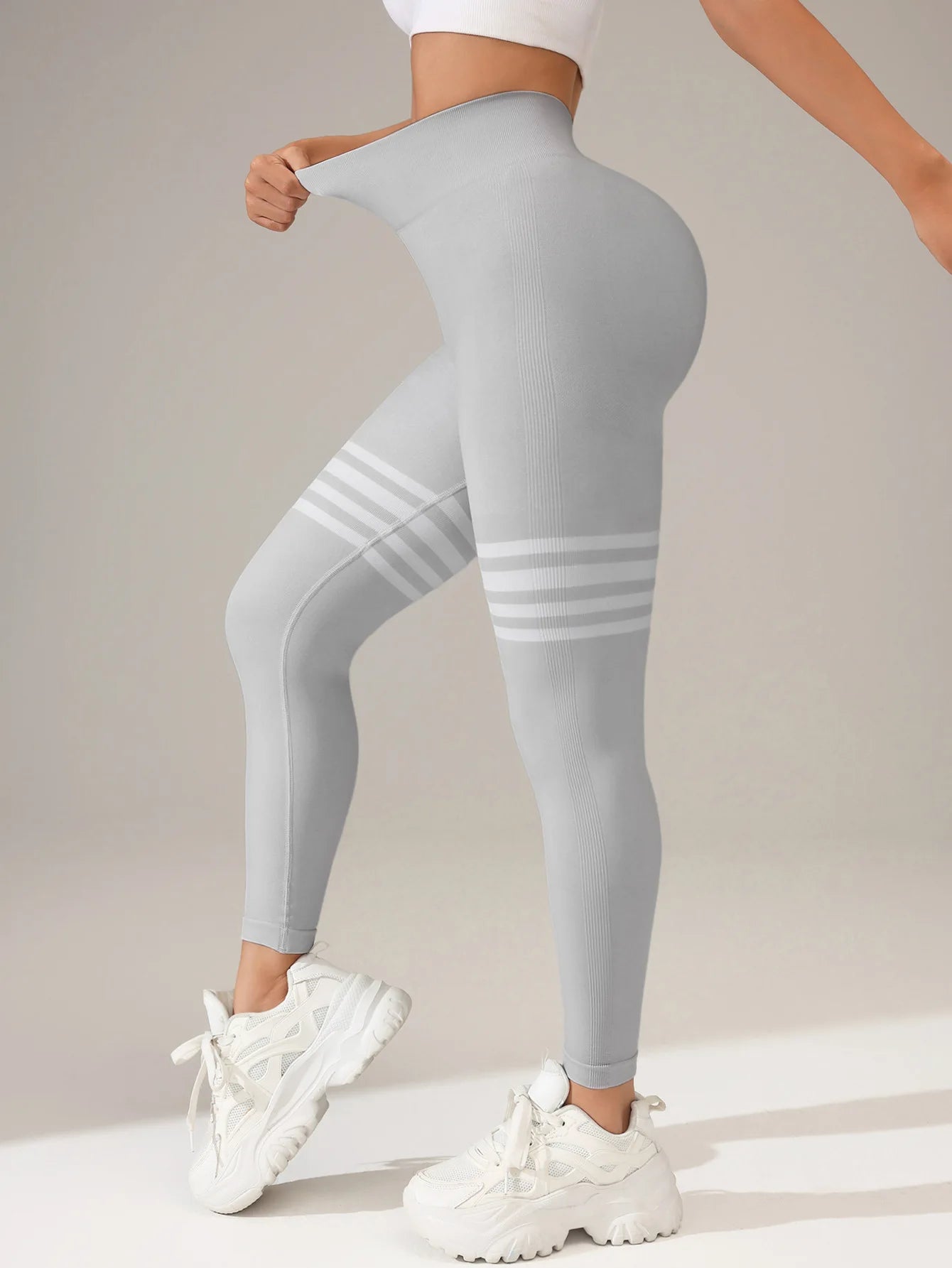 Legging de yoga taille haute à rayures sans coutures pour femmes avec contrôle du ventre 