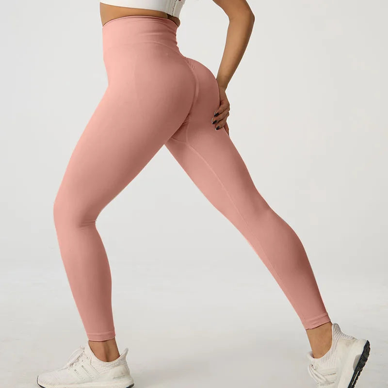 Legging de sport taille haute sans coutures couleur pêche pour le yoga et le fitness 