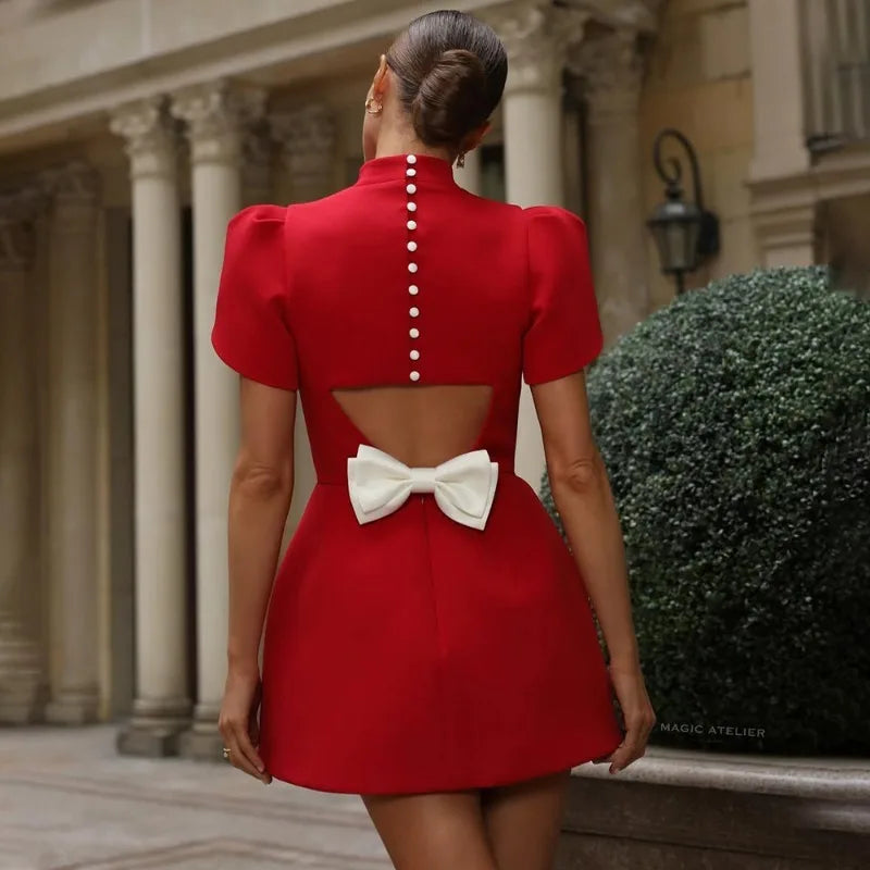 Mini Dress with Unique Back Bow and Button Detailing