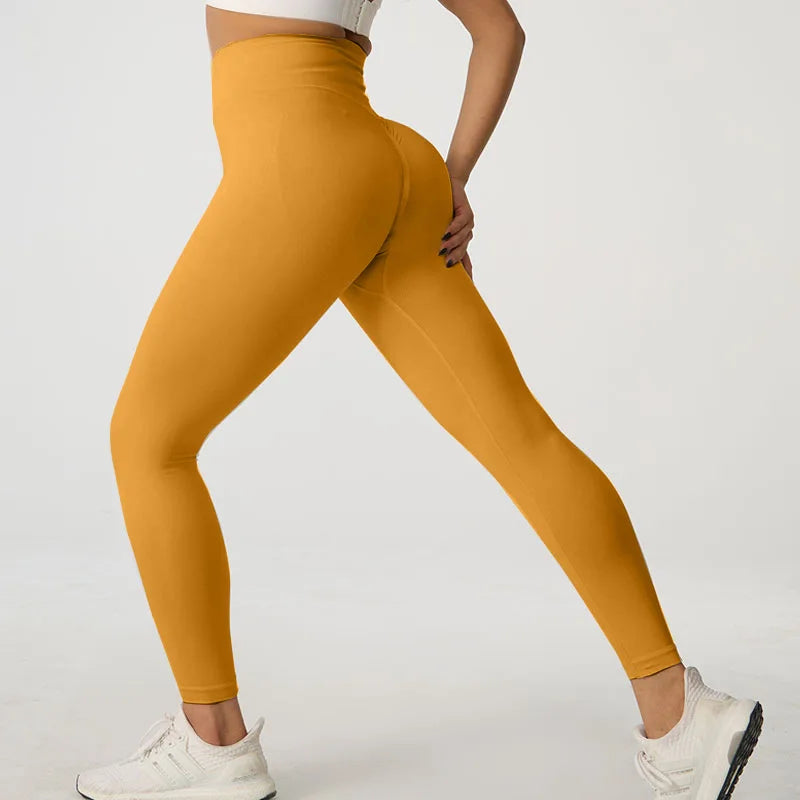 Legging de sport taille haute sans coutures couleur pêche pour le yoga et le fitness 