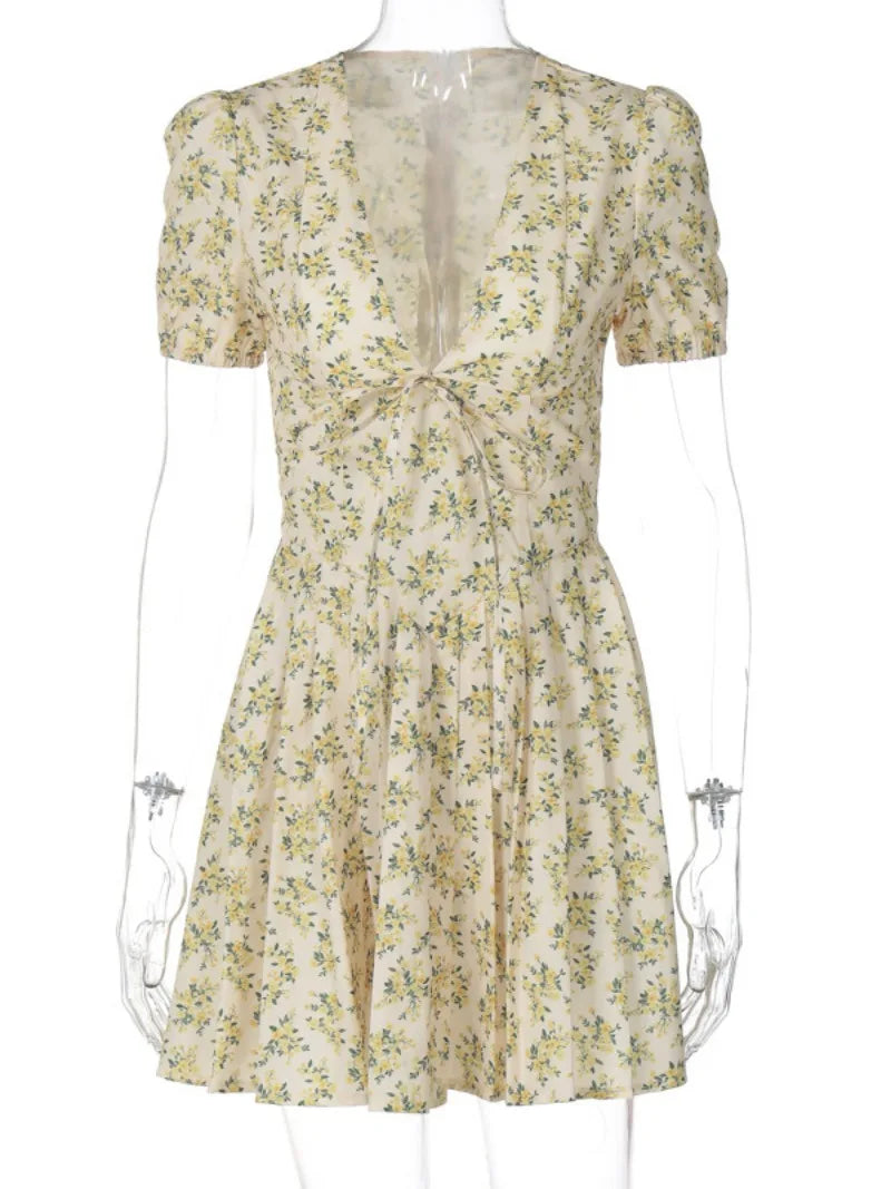 Women's Yellow Floral V-Neck Vacation Dress with Pleated Design