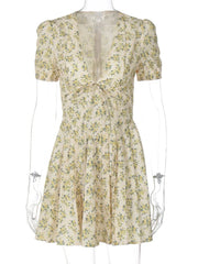 Women's Yellow Floral V-Neck Vacation Dress with Pleated Design