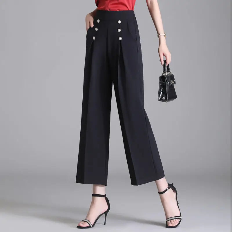 Pantalon large en soie glacée pour femme avec poches boutonnées et style drapé 