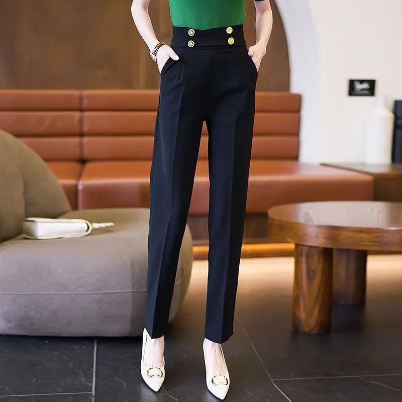 Pantalon de costume noir taille haute pour femme avec fermeture éclair et poches à l'arrière